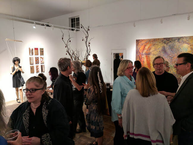Picture of gallery opening at MAC