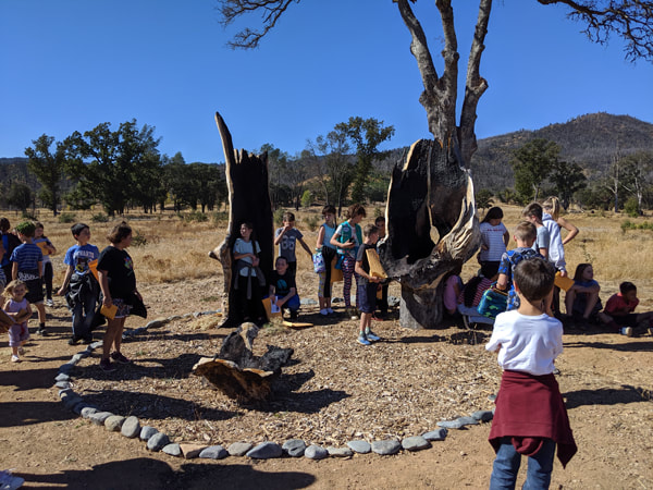Picture of students making art at MAC