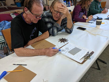 Picture, artist attending a workshop at MAC